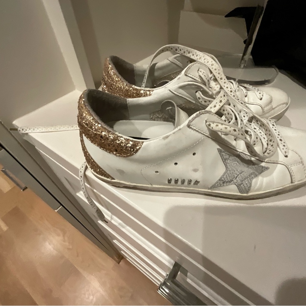 White and Gold Athletic Shoes with Star Design